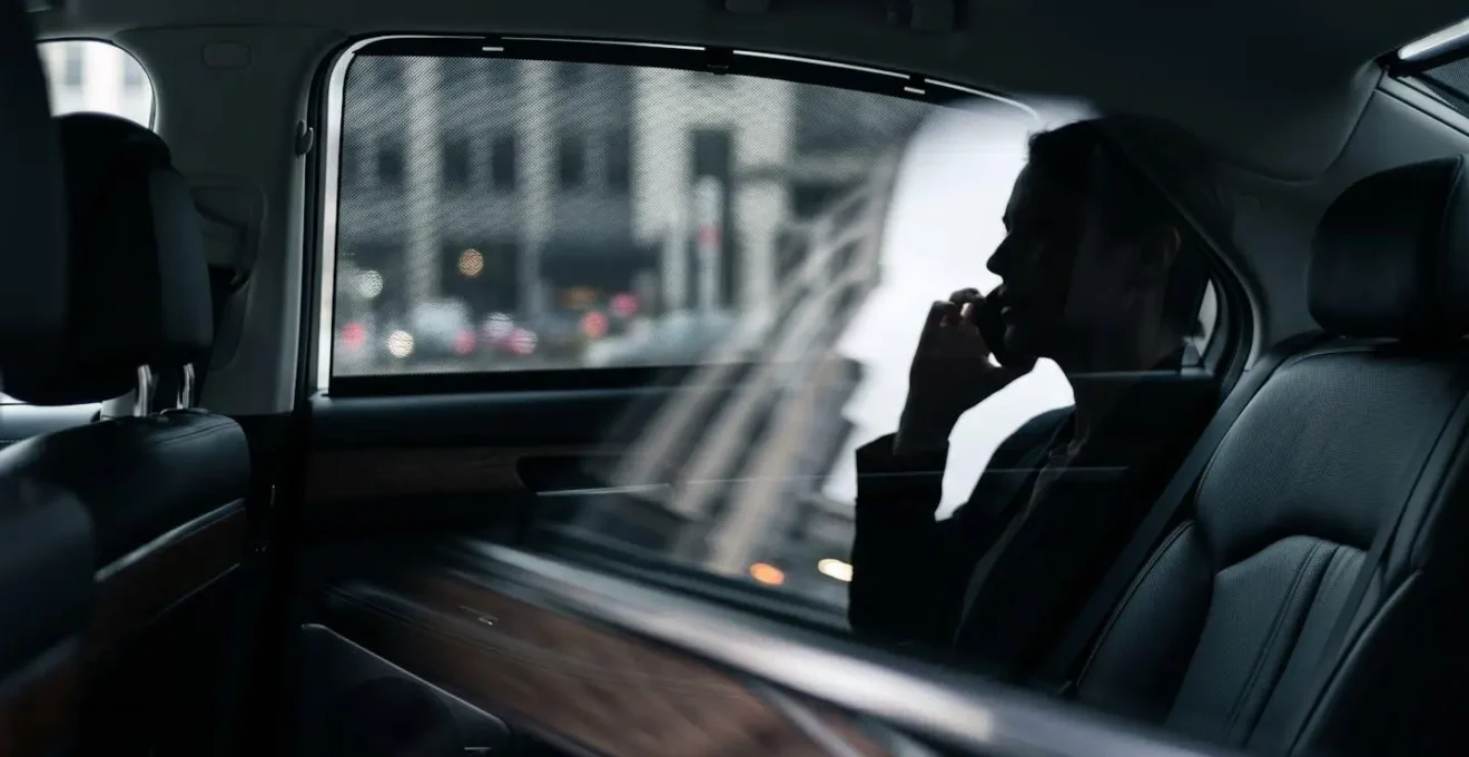 Interior view of luxury sedan rear compartment showing acoustic privacy features