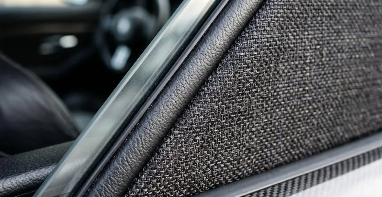 Interior view of luxury vehicle showing acoustic privacy features and secure communication setup
